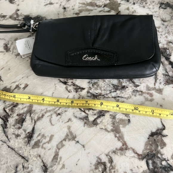 Coach Handbags - Vintage Coach black wristlet NWT